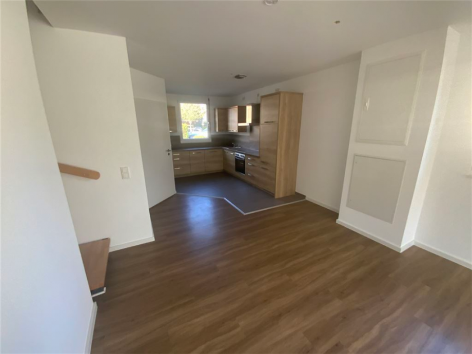 Wohnzimmer Blick auf die K�che Haus Bremen